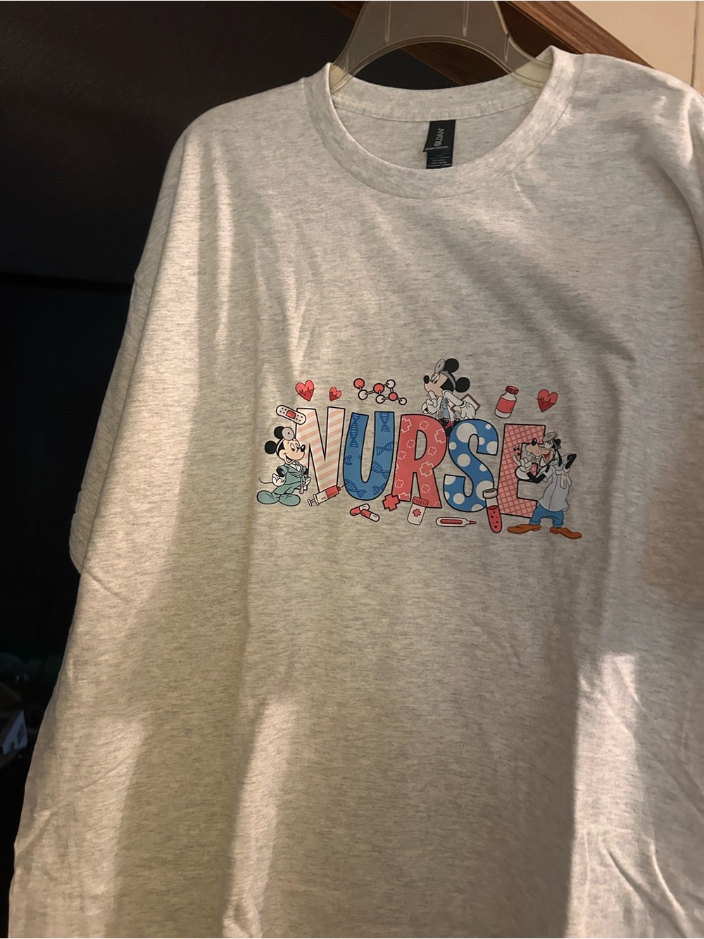 Gildan Light Gray Nurse Graphic Tee with Red and Blue Accents